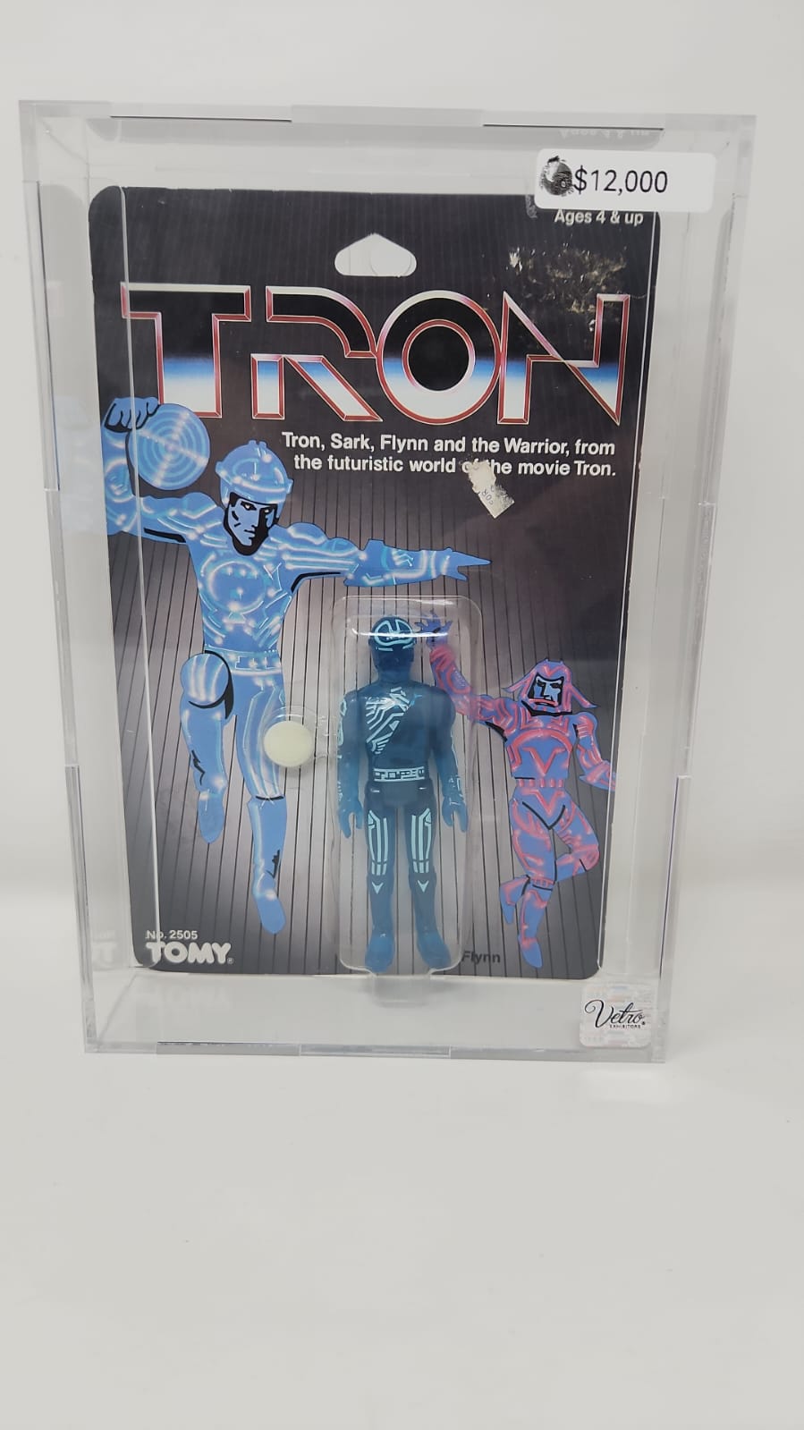 KEVIN FLYNN — TRON — TOMY — 1982 — FIGURA MOC No. 2505 — ENCAPSULADA VETRO COLLECTIONS