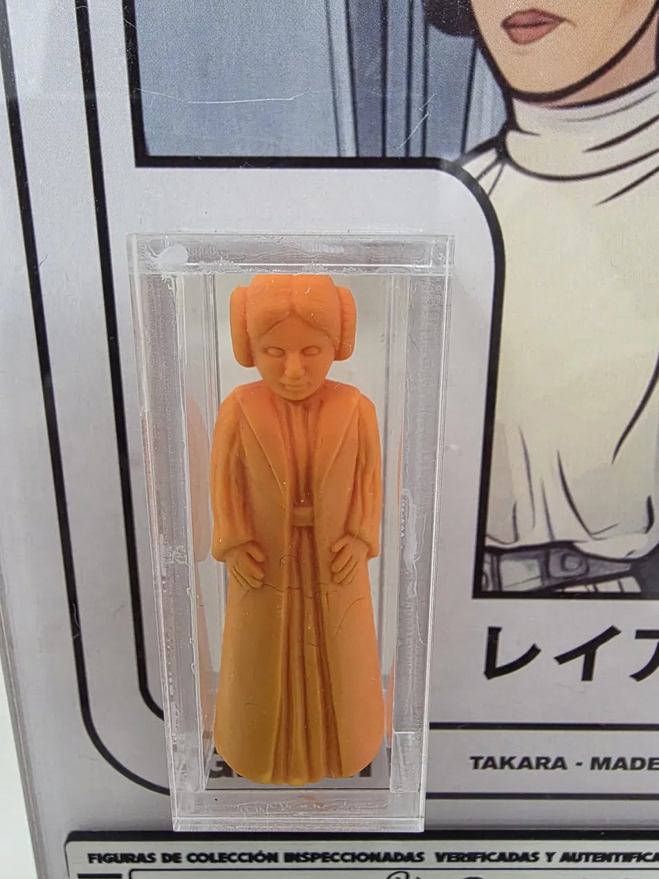 PRINCESA LEIA ORGANA レイア姫 Takara · Star Wars 12-Back Series · Keshi Gomu · Naranja   |   1978, Japón